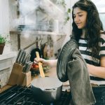 Woman cooking in pot